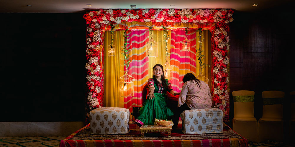 professional mehndi artist applying detailed bridal mehndi design
